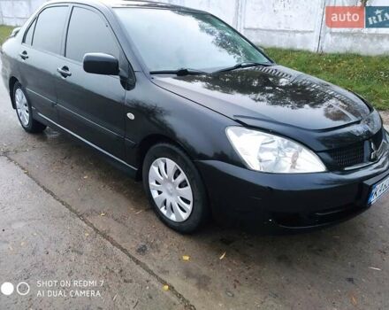 Мицубиси Лансер 2008 в Прилуках на Automoto.ua Черный Мицубиси Лансер, объемом двигателя 1.58 л и пробегом 219 тыс. км за 4900 $, фото 6 на Automoto.ua
