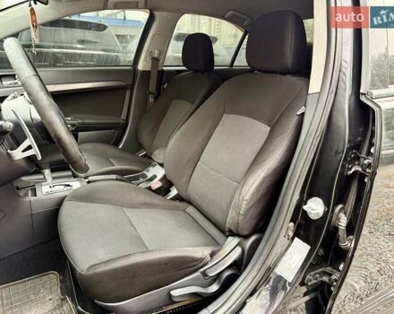 Чорний Міцубісі Lancer, об'ємом двигуна 2 л та пробігом 118 тис. км за 6200 $, фото 7 на Automoto.ua