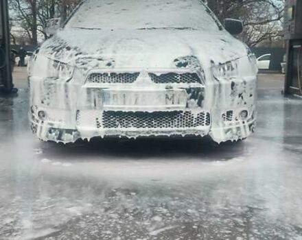 Черный Мицубиси Лансер, объемом двигателя 2 л и пробегом 217 тыс. км за 7000 $, фото 38 на Automoto.ua