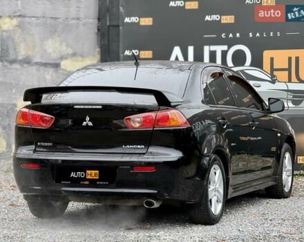Чорний Міцубісі Lancer, об'ємом двигуна 2 л та пробігом 118 тис. км за 6200 $, фото 6 на Automoto.ua