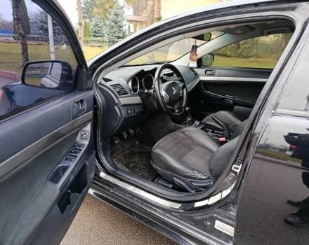 Черный Мицубиси Лансер, объемом двигателя 2 л и пробегом 200 тыс. км за 5100 $, фото 4 на Automoto.ua