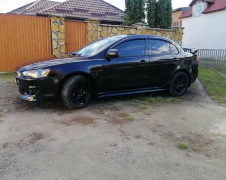 Міцубісі Lancer 2008 у Києві на Automoto.ua Чорний Міцубісі Lancer, об'ємом двигуна 2 л та пробігом 196 тис. км за 5500 $, фото 6 на Automoto.ua