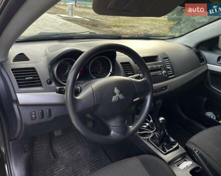 Чорний Міцубісі Lancer, об'ємом двигуна 1.5 л та пробігом 184 тис. км за 6000 $, фото 9 на Automoto.ua