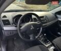 Чорний Міцубісі Lancer, об'ємом двигуна 1.5 л та пробігом 184 тис. км за 6000 $, фото 9 на Automoto.ua