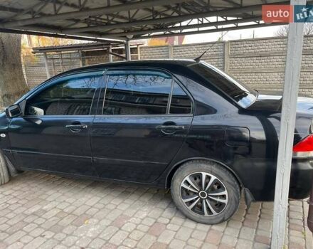 Чорний Міцубісі Lancer, об'ємом двигуна 1.6 л та пробігом 324 тис. км за 3800 $, фото 2 на Automoto.ua