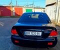 Чорний Міцубісі Lancer, об'ємом двигуна 1.6 л та пробігом 230 тис. км за 4700 $, фото 1 на Automoto.ua