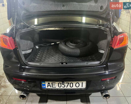 Черный Мицубиси Лансер, объемом двигателя 2 л и пробегом 200 тыс. км за 8000 $, фото 17 на Automoto.ua