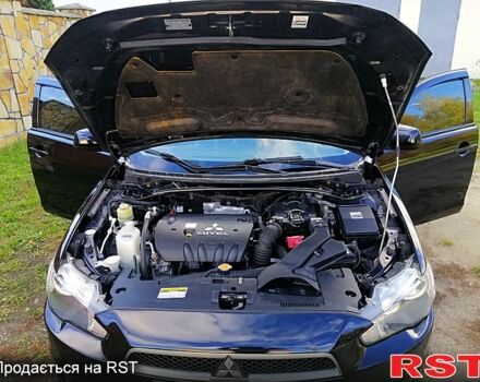 Черный Мицубиси Лансер, объемом двигателя 2 л и пробегом 196 тыс. км за 5500 $, фото 9 на Automoto.ua