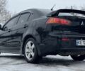 Черный Мицубиси Лансер, объемом двигателя 2 л и пробегом 280 тыс. км за 6800 $, фото 14 на Automoto.ua