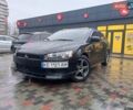 Черный Мицубиси Лансер, объемом двигателя 1.5 л и пробегом 217 тыс. км за 5700 $, фото 1 на Automoto.ua