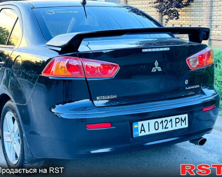 Чорний Міцубісі Lancer, об'ємом двигуна 2 л та пробігом 240 тис. км за 5900 $, фото 6 на Automoto.ua