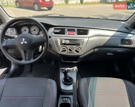 Чорний Міцубісі Lancer, об'ємом двигуна 1.6 л та пробігом 296 тис. км за 4200 $, фото 34 на Automoto.ua
