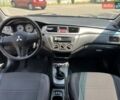 Чорний Міцубісі Lancer, об'ємом двигуна 1.6 л та пробігом 296 тис. км за 4200 $, фото 34 на Automoto.ua