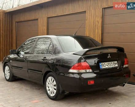 Чорний Міцубісі Lancer, об'ємом двигуна 1.6 л та пробігом 265 тис. км за 4700 $, фото 12 на Automoto.ua