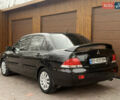 Чорний Міцубісі Lancer, об'ємом двигуна 1.6 л та пробігом 265 тис. км за 4700 $, фото 12 на Automoto.ua