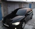 Чорний Міцубісі Lancer, об'ємом двигуна 2 л та пробігом 191 тис. км за 7000 $, фото 1 на Automoto.ua