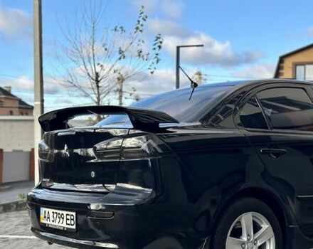 Черный Мицубиси Лансер, объемом двигателя 2 л и пробегом 150 тыс. км за 7850 $, фото 22 на Automoto.ua