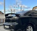 Черный Мицубиси Лансер, объемом двигателя 2 л и пробегом 150 тыс. км за 7850 $, фото 22 на Automoto.ua