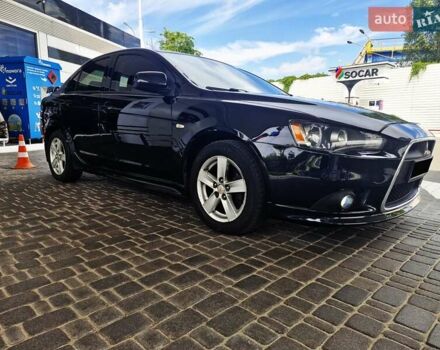 Чорний Міцубісі Lancer, об'ємом двигуна 2 л та пробігом 240 тис. км за 7850 $, фото 5 на Automoto.ua