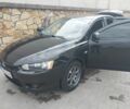 Чорний Міцубісі Lancer, об'ємом двигуна 1 л та пробігом 240 тис. км за 5650 $, фото 1 на Automoto.ua