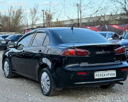 Чорний Міцубісі Lancer, об'ємом двигуна 1.5 л та пробігом 220 тис. км за 4600 $, фото 3 на Automoto.ua