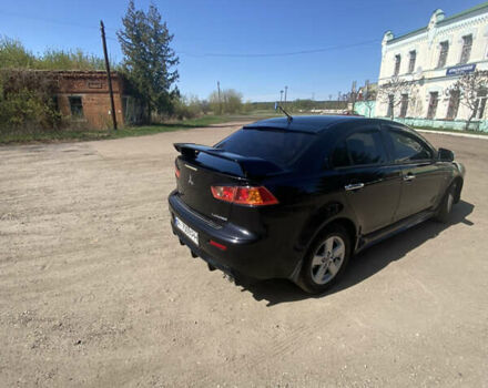 Чорний Міцубісі Lancer, об'ємом двигуна 2 л та пробігом 237 тис. км за 7599 $, фото 11 на Automoto.ua