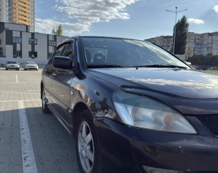Чорний Міцубісі Lancer, об'ємом двигуна 1.6 л та пробігом 364 тис. км за 3000 $, фото 3 на Automoto.ua