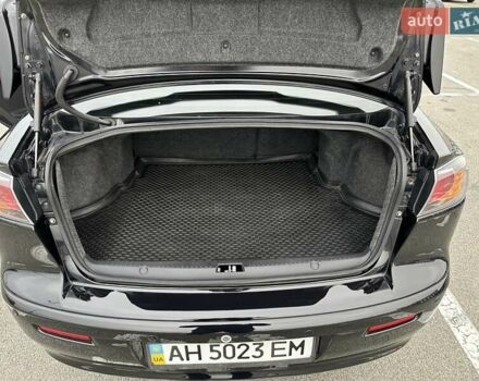 Чорний Міцубісі Lancer, об'ємом двигуна 2 л та пробігом 199 тис. км за 7900 $, фото 35 на Automoto.ua