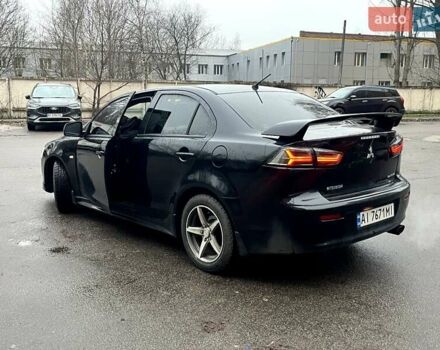 Черный Мицубиси Лансер, объемом двигателя 2 л и пробегом 217 тыс. км за 7000 $, фото 34 на Automoto.ua