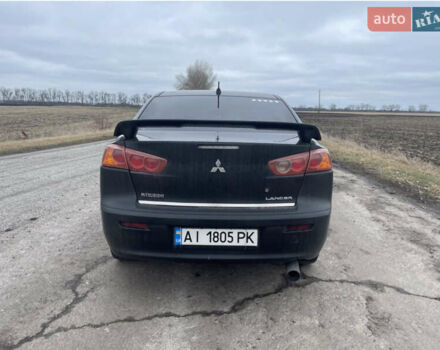 Чорний Міцубісі Lancer, об'ємом двигуна 2 л та пробігом 280 тис. км за 4400 $, фото 5 на Automoto.ua