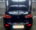 Чорний Міцубісі Lancer, об'ємом двигуна 2 л та пробігом 126 тис. км за 5800 $, фото 3 на Automoto.ua