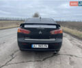 Чорний Міцубісі Lancer, об'ємом двигуна 2 л та пробігом 280 тис. км за 4400 $, фото 5 на Automoto.ua
