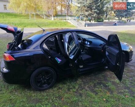 Мицубиси Лансер 2008 в Киеве на Automoto.ua Черный Мицубиси Лансер, объемом двигателя 2 л и пробегом 196 тыс. км за 5500 $, фото 27 на Automoto.ua