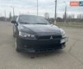 Черный Мицубиси Лансер, объемом двигателя 2 л и пробегом 247 тыс. км за 6600 $, фото 1 на Automoto.ua