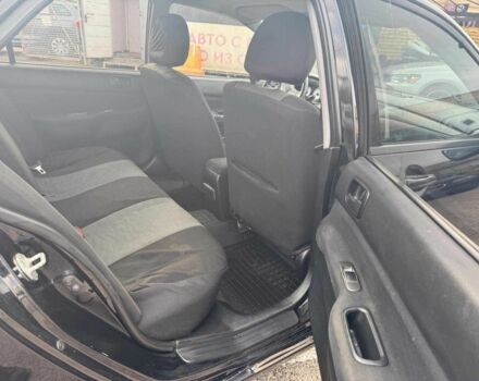 Мицубиси Лансер 2008 в Запорожье на Automoto.ua Черный Мицубиси Лансер, объемом двигателя 1.6 л и пробегом 316 тыс. км за 4290 $, фото 12 на Automoto.ua