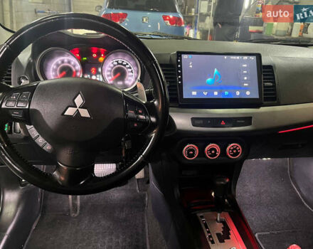 Черный Мицубиси Лансер, объемом двигателя 2 л и пробегом 200 тыс. км за 8000 $, фото 10 на Automoto.ua