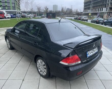 Черный Мицубиси Лансер, объемом двигателя 1.6 л и пробегом 226 тыс. км за 3750 $, фото 2 на Automoto.ua
