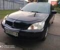 Черный Мицубиси Лансер, объемом двигателя 1.58 л и пробегом 217 тыс. км за 4900 $, фото 1 на Automoto.ua