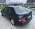 Черный Мицубиси Лансер, объемом двигателя 1.6 л и пробегом 226 тыс. км за 3750 $, фото 2 на Automoto.ua