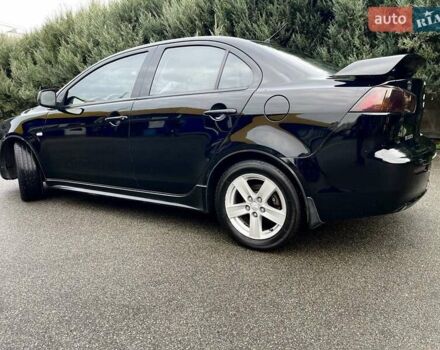 Чорний Міцубісі Lancer, об'ємом двигуна 2 л та пробігом 217 тис. км за 5600 $, фото 8 на Automoto.ua