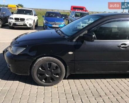Мицубиси Лансер 2008 в Львове на Automoto.ua Черный Мицубиси Лансер, объемом двигателя 1.6 л и пробегом 356 тыс. км за 4590 $, фото 15 на Automoto.ua