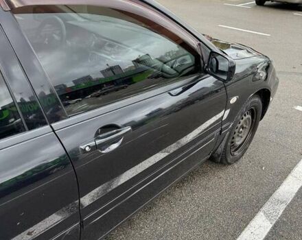 Чорний Міцубісі Lancer, об'ємом двигуна 1.6 л та пробігом 245 тис. км за 4500 $, фото 6 на Automoto.ua