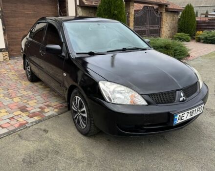 Чорний Міцубісі Lancer, об'ємом двигуна 1.6 л та пробігом 220 тис. км за 3600 $, фото 1 на Automoto.ua