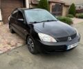 Чорний Міцубісі Lancer, об'ємом двигуна 1.6 л та пробігом 220 тис. км за 3600 $, фото 1 на Automoto.ua