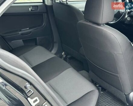 Чорний Міцубісі Lancer, об'ємом двигуна 2 л та пробігом 199 тис. км за 7900 $, фото 21 на Automoto.ua