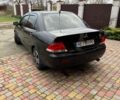 Чорний Міцубісі Lancer, об'ємом двигуна 1.6 л та пробігом 220 тис. км за 3600 $, фото 6 на Automoto.ua