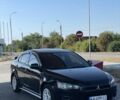 Чорний Міцубісі Lancer, об'ємом двигуна 2 л та пробігом 200 тис. км за 5650 $, фото 1 на Automoto.ua