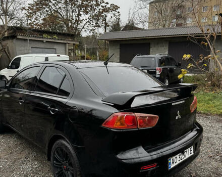 Черный Мицубиси Лансер, объемом двигателя 1.5 л и пробегом 278 тыс. км за 4200 $, фото 1 на Automoto.ua