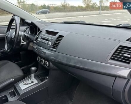 Чорний Міцубісі Lancer, об'ємом двигуна 2 л та пробігом 199 тис. км за 7900 $, фото 17 на Automoto.ua