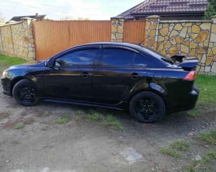 Міцубісі Lancer 2008 у Києві на Automoto.ua Чорний Міцубісі Lancer, об'ємом двигуна 2 л та пробігом 196 тис. км за 5500 $, фото 3 на Automoto.ua
